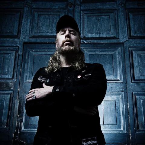 Tomas #Tompa #Lindberg, standing in front of a huge door.
Photo: At the Gates