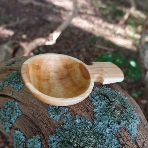 Wooden scoop from the side