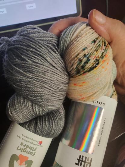 Gray and cream speckled skeins together