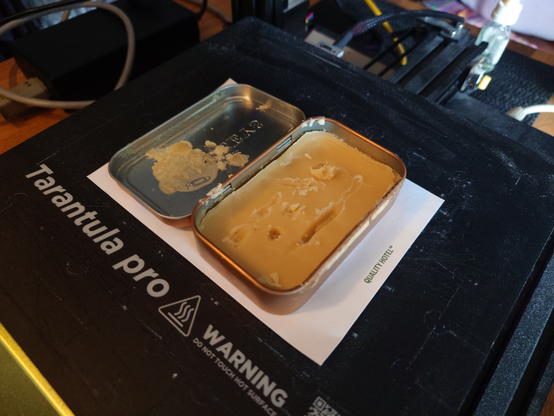 Me using a 3D printer bed to warm up some homemade wood wax I use to seal wooden combs