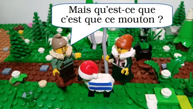 Un berger et une bergère sont devant un mouton rayé avec un bonnet de Noël. Le berger dit "Mais qu'est-ce que c'est que ce mouton ?"