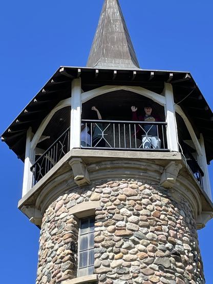 Me at the top of the Pioneer Tower waving.