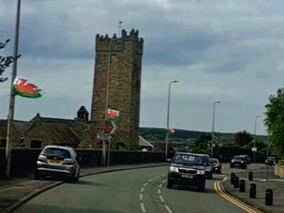 Welsh flags attached to lampposts in Pembrey, Carmarthenshire