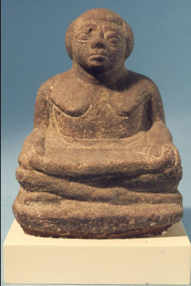 Quartzite figure of a male scribe, Egypt, Old Kingdom (about 2686–2181 BC).