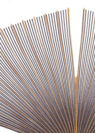 Ginko leaf shaped line art with dense lines in black india ink and a second layer of less dense lines in bronze metallic ball pen on white drawing paper.
Closeup on the upper part of the leaf to show the fine structure of lines and paper.
