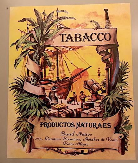 Foto van een Braziliaanse tabaksreclame met palmbomen, een zeilschip en balen sjouwende arbeiders
