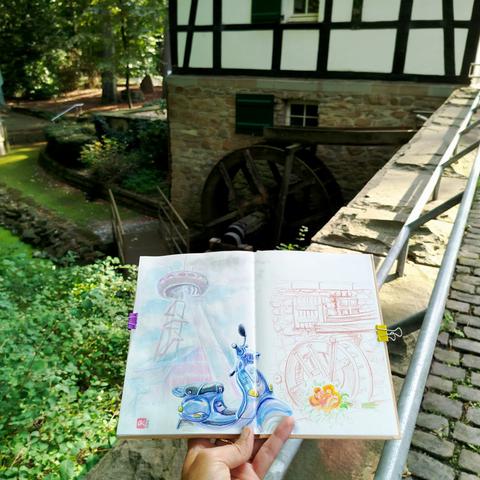 Sketchbook in front of the mill.