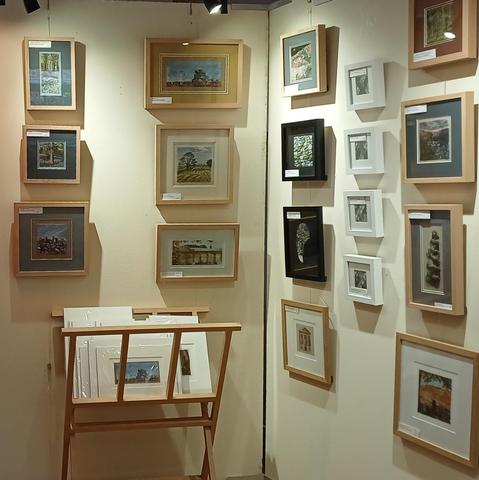 Cream walls with framed artwork on display