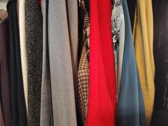 Fall and winter fabrics in autumn yellow and winter red, white, and black.