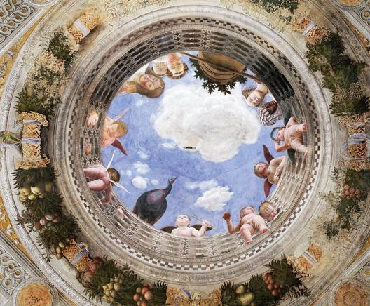 Vue de l'oculus de la Chambre des époux de Mantegna (1465-74) : au centre, un cercle ouvert vers le ciel peint en bleu avec quelques nuages peints. Autour, une rambarde en pierre blanche derrière laquelle sont représentées plusieurs femmes (ou une seule ?) et des angelots. On voit également un paon en bas et un pot avec un oranger en haut. Tout autour, une guirlande végétale sur un fond qui imite un décor blanc en stuc sur fond doré.
Il faut lire le commentaire de Daniel Arasse sur cette chambre !
