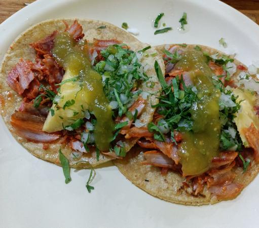 another photo of tacos al pastor, typically eaten in every taquería.