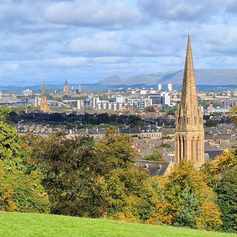 A view across Glasgow to the distant hills beyond the city.