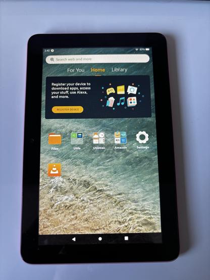 Small tablet with a big banner asking you to register your device.