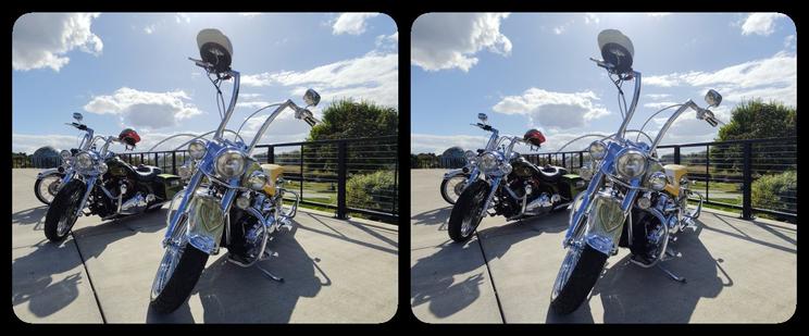 Low angle on lowrider motorcycles, stereoscopic.