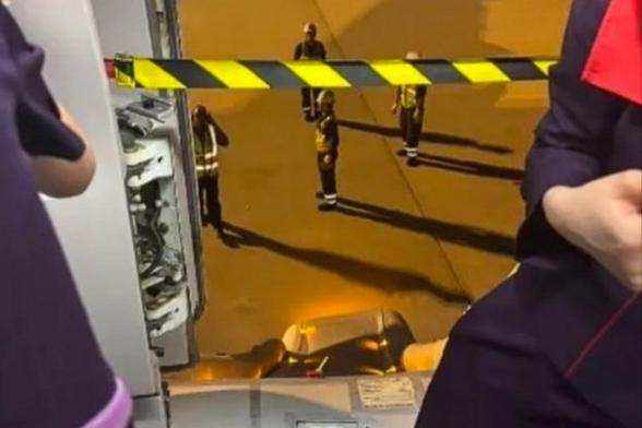 Bangkok Post - Emergency exit, slide of Hong Kong Airlines plane triggered after landing in Osaka