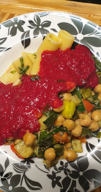 Rigatoni Pasta w/ Chickpea, Leek, Pepper & Courgette, topped w/ Easy Beet Pasta Sauce.