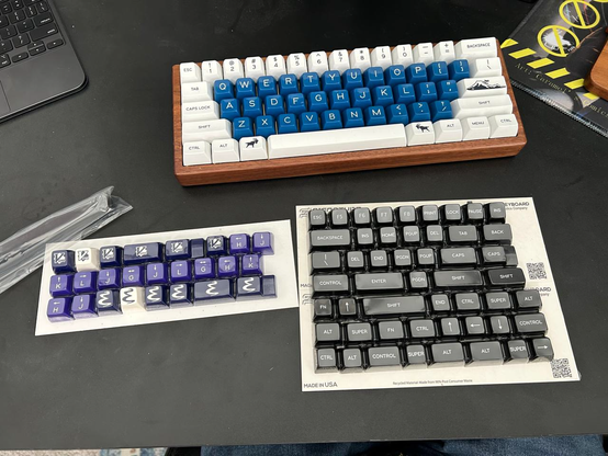 60% mechanical keyboard with new shrink-wrapped caps (before)