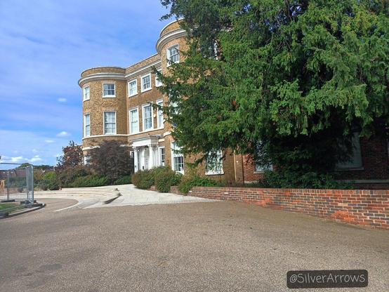 The gallery. It's an old brick building with circular walls on the side