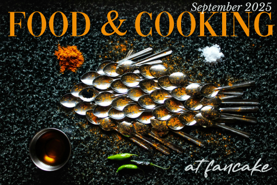 Photograph of steel spoons and spices in a dramatic setting with added text that gives it the look of a gourmet magazine cover: September 2025. Food & Cooking, at Fancake. Steel teaspoons are arranged in an elogated oval to suggest a fish, with the bowls acting as scales and some of the handles left visible to create the fins and tail, giving the creature a spiky appearance. The concave bowls are dusted with a powdery orange spice for color and one spoon at the front of the fish is filled with a coarse black spice to create an eye. The fish is on a black surface with a rough texture and around it are three skinny green peppers, a mound of salt, a mound of orange spice, and a dipping bowl filled with a clear amber liquid.
