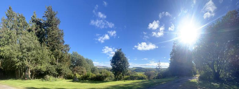 Looking towards Ruberslaw from Hassendean Burn under a blue sky