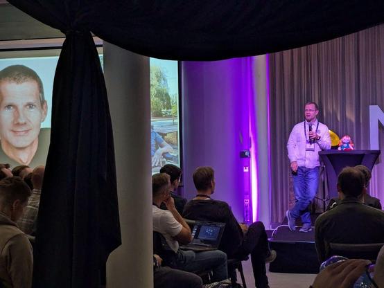 Cippi, Rainer's mascot, on stage with Klaus at the opening keynote for NDCTechTown