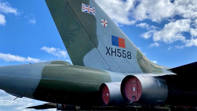 Close-up of the Vulcan’s tail showing serial number XH558 and British insignia.