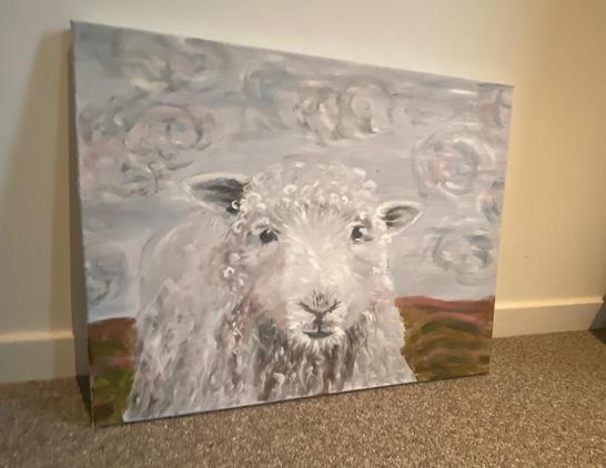 painted sheep on canvas. Clouds behind her or him.