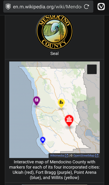 A screenshot from the web version of Wikipedia showing a map with a few interactive pips on it. The article is about Mendocino County in California.