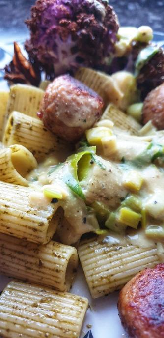 Mezze Manichi pasta, IKEA Huvudroll plant balls, Leek & yeast flake 'cheese' sauce, Air-fried purple cauliflower