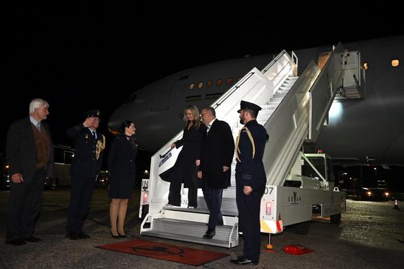 Anthony Albanese and his fiancee, Jodie Haydon, disembark on arrival at Stansted airport in London. Photograph: Lukas Coch/AAP
