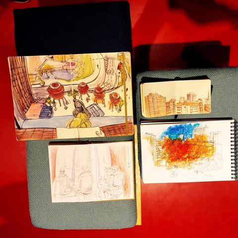 Four sketchbooks at the end of the meeting.