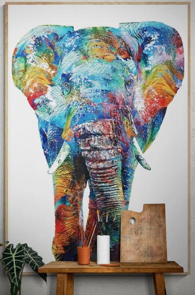 Colorful Elephant on white in a furniture setting.