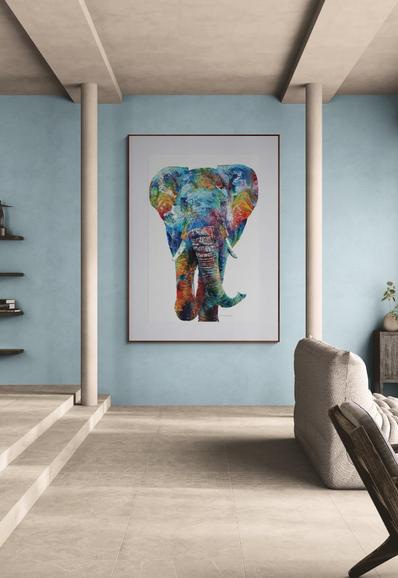 Colorful elephant on white in a furniture setting.