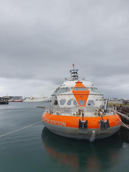 ship in harbour
Other vessels in background