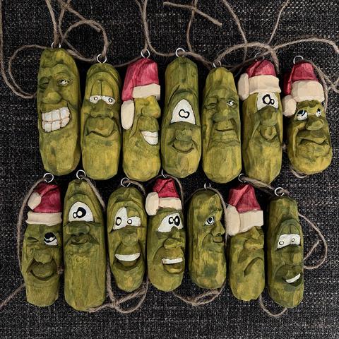 A passle of pickled pickles, handcarved from wood.