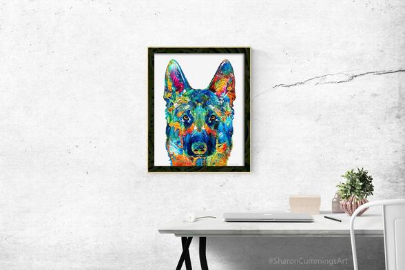 Colorful German Shepherd Dog art on white in a black frame in an office setting.