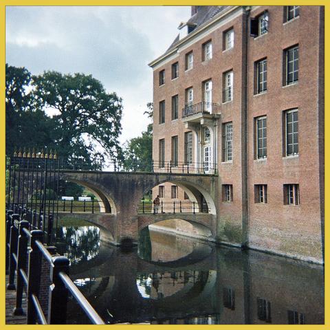 A unique 2-storey bridge give entrance to this in 1673 builded house. (this is an analog photo, made with a Kodak Funsaver disposable camera)