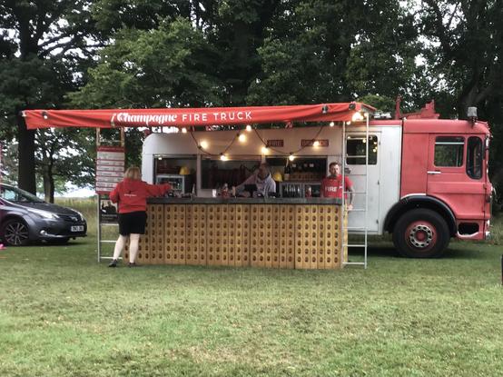 Ex-Leicester AEC fire truck being used as a catering vehicle, side view