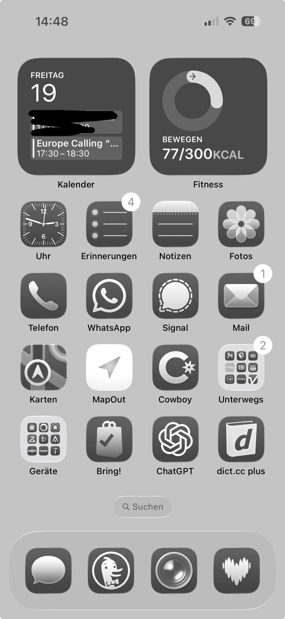 iOS Home Screen with various app icons and widgets, all in greyscale.