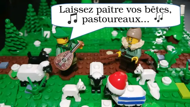 Tout en Lego, un musicien entouré de moutons et en face d'un berger chante "Laissez paitres vos bêtes pastoureaux"