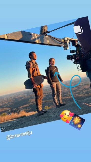 Brianne Tju posted this behind the scenes still of Uglies costars Joey King and Keith Powers in costume. Joey King is wearing the silver Geoheart pendant necklace by Xover0.