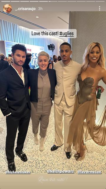 Costume Designer Cris Araujo shared a red carpet shot from the premiere of Uglies. In this image she is posing with costars Chase Stokes, Keith Powers, and Laverne Cox. Ms. Araujo wears Xover0's silver Geoheart necklace - a nod to it's connection to the movie.
