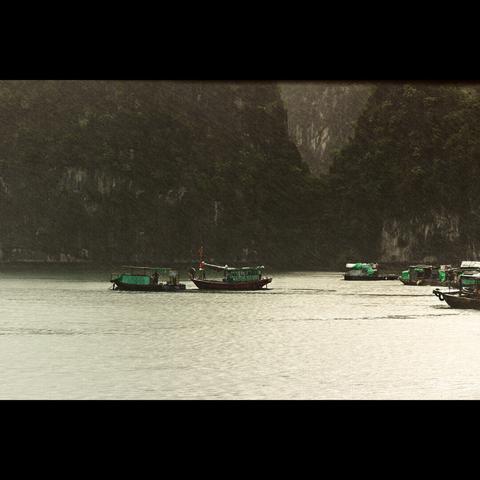 fishermen on their boat, Halong Baie, Vietnam