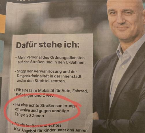 Wahlplakat von Alexander Omar Kalouti, Bürgermeister-Kandidat der Dortmunder CDU 2025. Sein Motto u.a.: "Dafür stehe ich: ...gegen unnötige Tempo-30-Zonen"