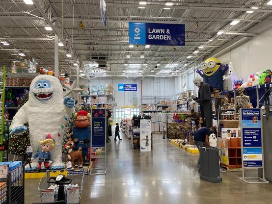 A snapshot from near the entrance of a big-box hardware store, looking down one of the aisles. On the left is a display of giant animated figures of Christmas schlock culture, prominently displaying the giant yeti from the Rudolph the Red-Nosed Reindeer movie that hits US TV every December. On the right, a display of equally schlocky giant animated Halloween figures, including a giant cartoonish vampire and a number of giant skeletons. 
The Halloween figures seem to have the Christmas figures outnumbered, at least for the time being. Perhaps they can hold them off with a defensive formation. 
It’s still September, not even October yet.