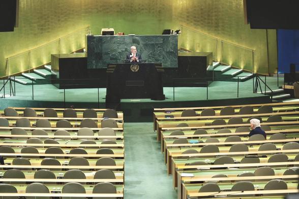 A piece of montage art by the famous Cold War Steve, showing Netanyahu delivering his speech at the UN to a completely empty hall, apart from a rear view of Trump sitting listening, surrounded by empty seats.