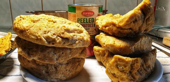 6 large pieces of seitan on a plate, with a can of tomatoes behind to give an idea of size.