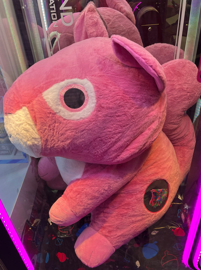 Giant pink squirrel stuffie.