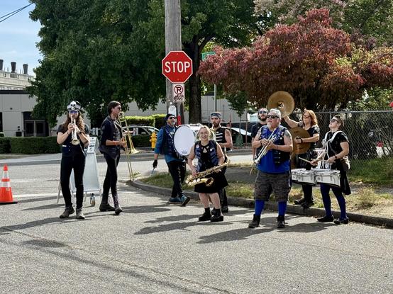 Brass band performs on a closed street