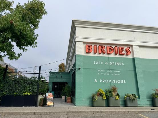 Outside of Birdies - red sign that says Birdies then Ears & Drinks & Provisions. 

Yes it’s an Earl’s sub brand.